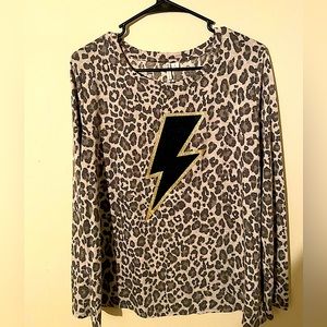 cheetah long sleeve shirt with a sparkly lighting bolt in middle
